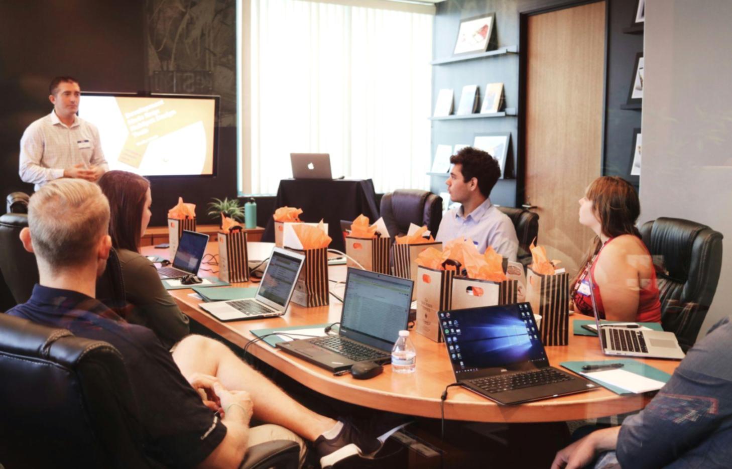 Workshop participant reviewing budget planning materials